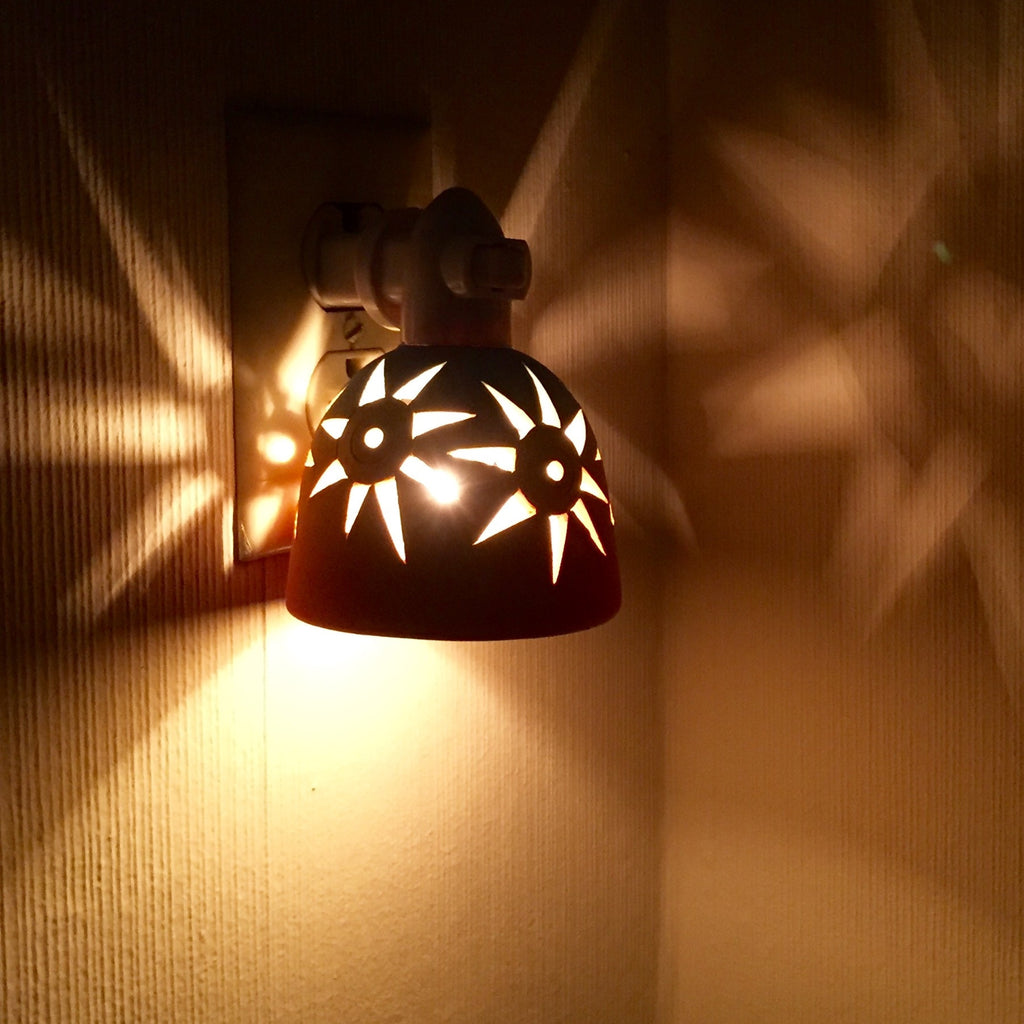 round night light "starbursts" in sunset colors