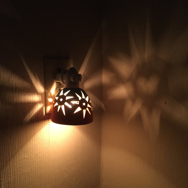 round night light "starbursts" in sunset colors